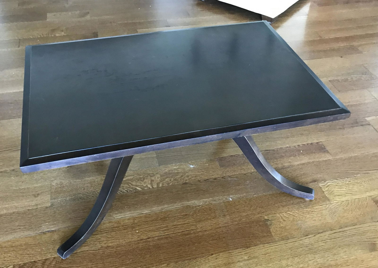 Contemporary Coffee Table w Book Matched Top: Contemporary Coffee Table w Book Matched Top. Scroll work legs, top with four triangles in book matched pattern. Measures 19 x 42 x 28.5 inches.