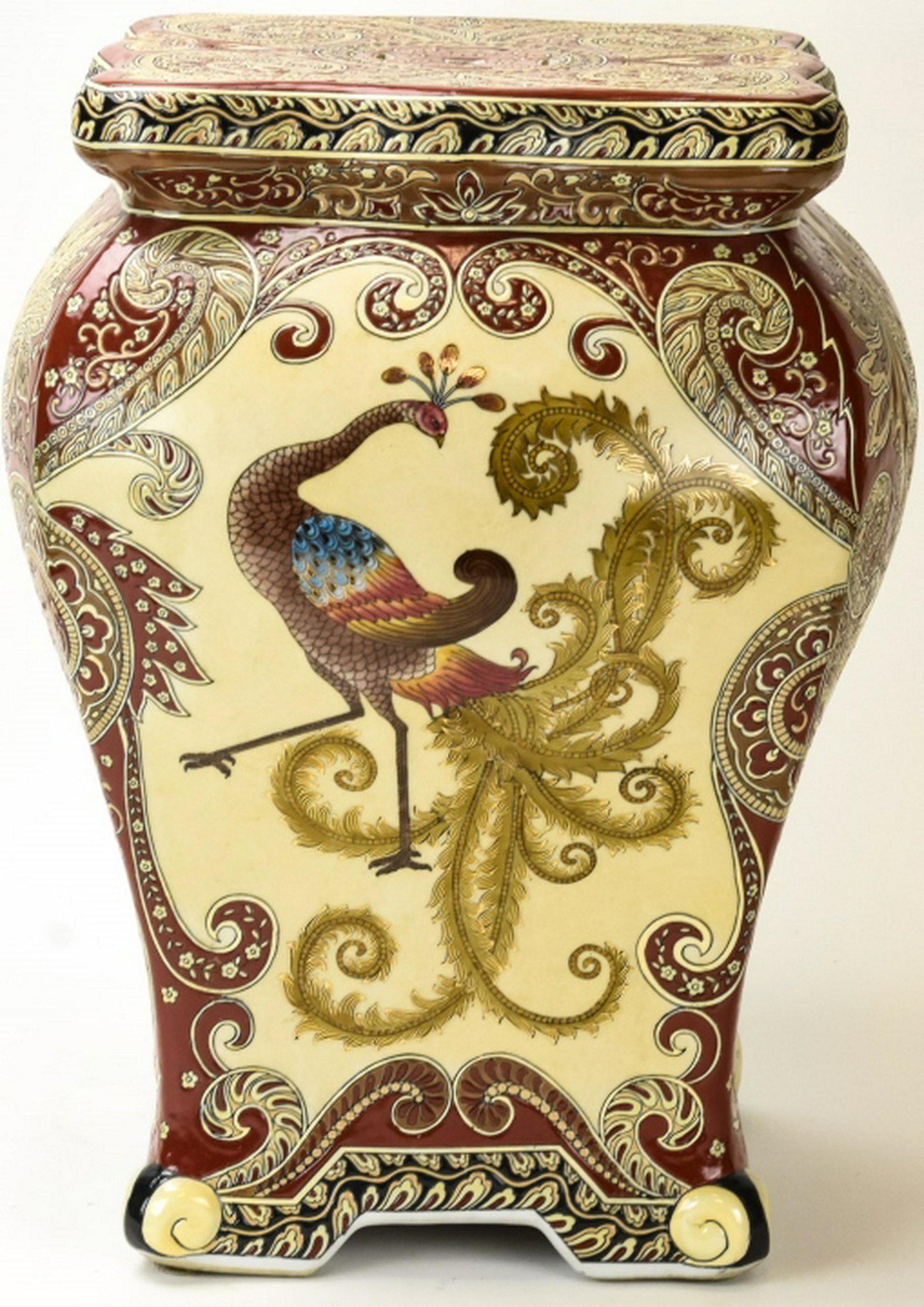 Asian Porcelain Peacock Motif Garden Stool: Asian Porcelain Peacock Motif Garden Stool. Asian porcelain garden stool featuring a peacock and paisley motif. 18 inches x 12 inches x 12 inches.