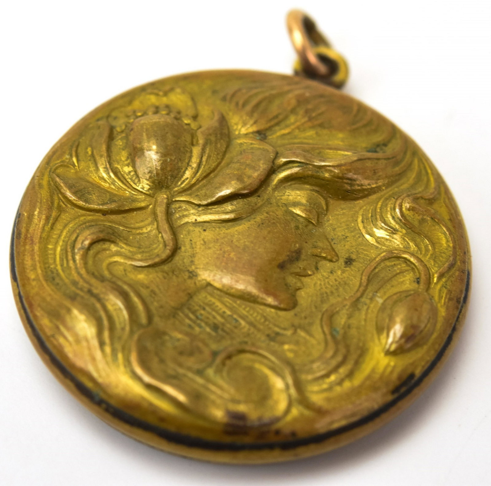 Antique Art Nouveau Pendant w Mourning Locket: Antique Art Nouveau Pendant w Mourning Locket. Art Nouveau repousse portrait of a lady on the front, glass front locket on the back. Measures 1.5 inches in length w bail.