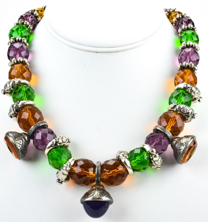 Circa 1960s Art Glass & Intaglio Charm Necklace: Circa 1960s Art Glass & Intaglio Charm Necklace. Silver tone necklace with art glass beads featuring two intaglio charms. Measures 18.5 inches in length.