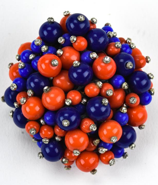 Vintage Circa 1930s Mastercraft Beaded Brooch: Vintage Circa 1930s Mastercraft Beaded Brooch. Faux coral and faux lapis set with rhinestones. Measures 2.25 inches in diameter.