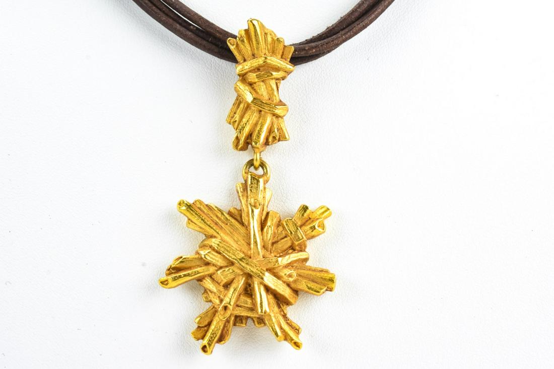 Christian Lacroix Textured Gilt Metal Necklace: Vintage Christian Lacroix Textured Gilt Metal Necklace. Measures 16.5 inches in length. Triple strand leather necklace with textured gilt metal clasp and pendant. Circa 1990s.