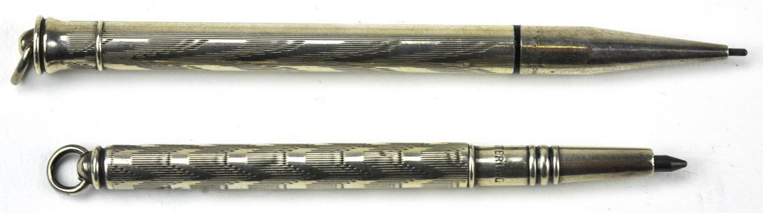 2 Antique Art Deco Sterling Silver Pencil Pendants: 2 Antique Art Deco Sterling Silver Pencil Pendants. Hallmarked. Longer measures 3.5 inches in length.