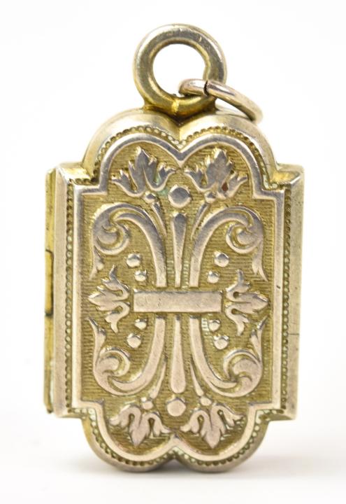 Antique 19th C Sterling Silver Locket Pendant: Antique 19th C Sterling Silver Locket Pendant. Scrollwork motif locket necklace pendant. Measures just over 1.5 inches in length.