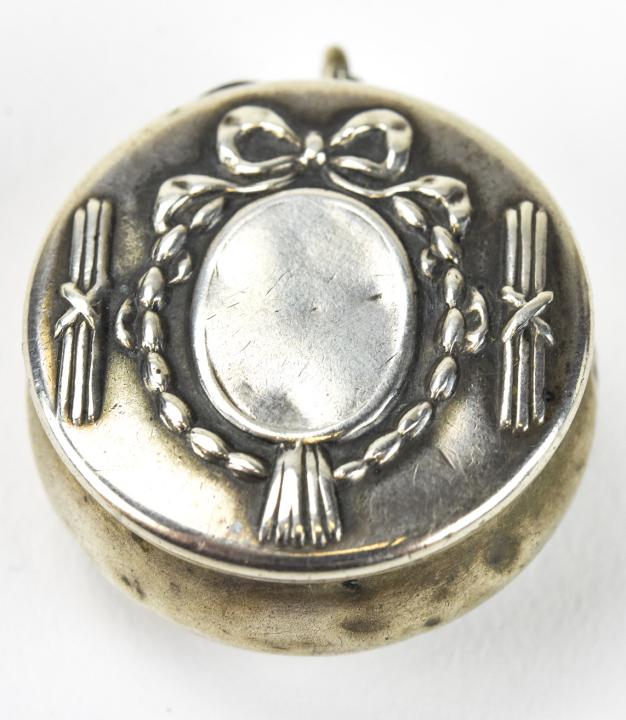 Antique Edwardian Sterling Silver Locket Pendant: Antique Edwardian Sterling Silver Locket Pendant. Miniature compact locket necklace pendant. 1 inch in diameter.
