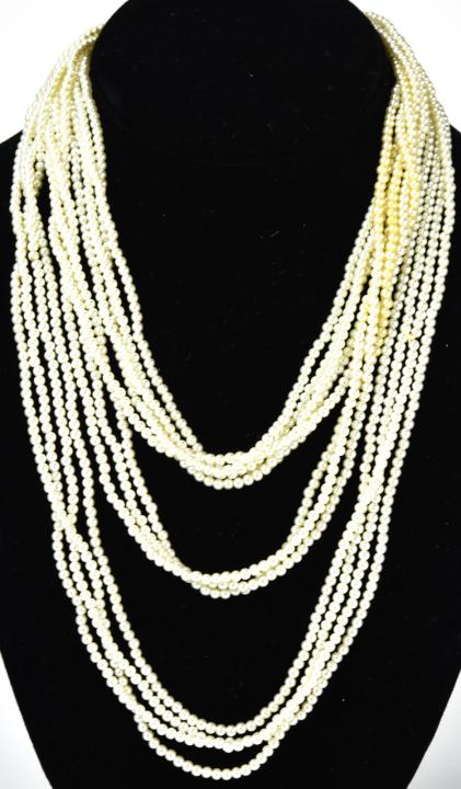 Vintage Multi Strand Miriam Haskell Pearl Necklace: Vintage Multi Strand Miriam Haskell Pearl Necklace. Miriam Haskell tag at clasp. Measures 60 inches at longest strand.