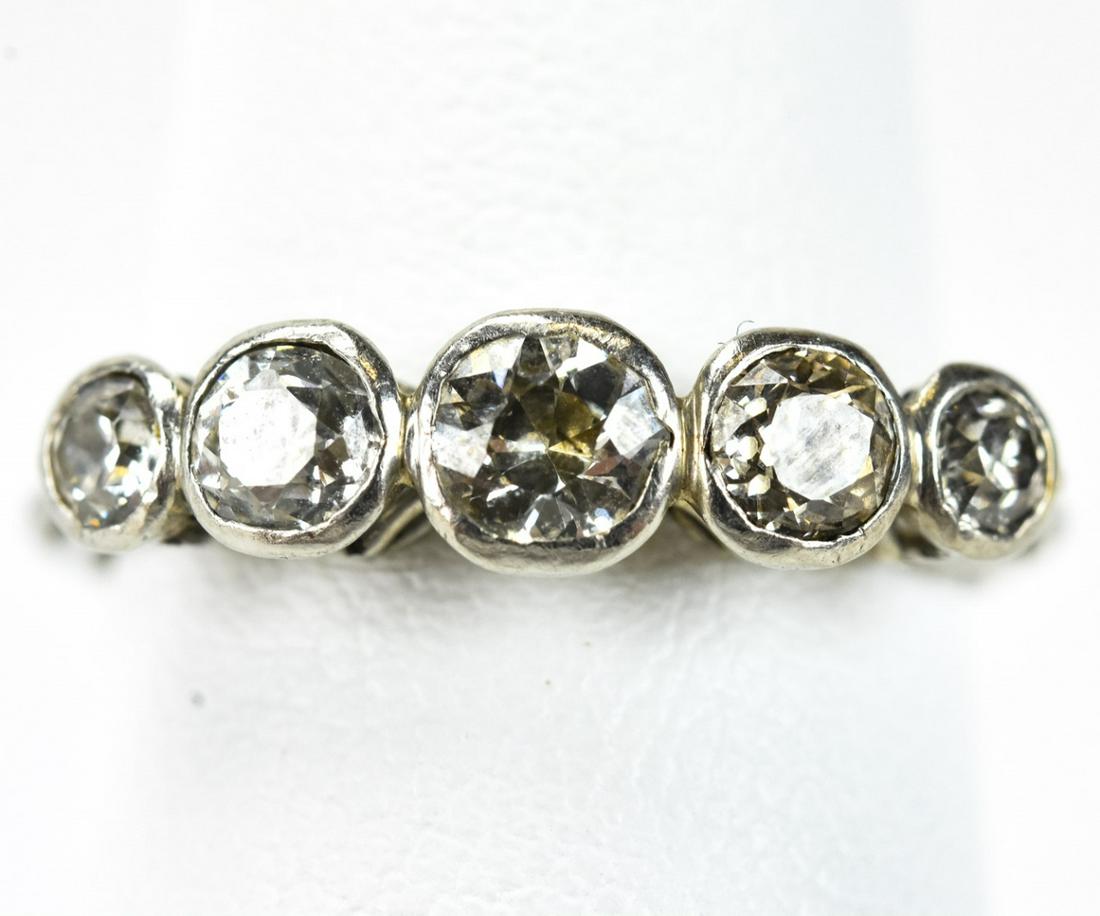 Antique Edwardian Platinum 5 Diamond Ring: Antique Edwardian Platinum 5 Diamond Ring. Set with 5 diamonds totaling approximately .65 of a carat. Ring size 5.75.