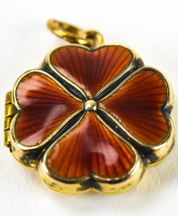 Antique Clover Form Gold Fill & Enamel Locket: Antique Clover Form Gold Fill & Enamel Locket. 7/8 of an inch in length with bail.
