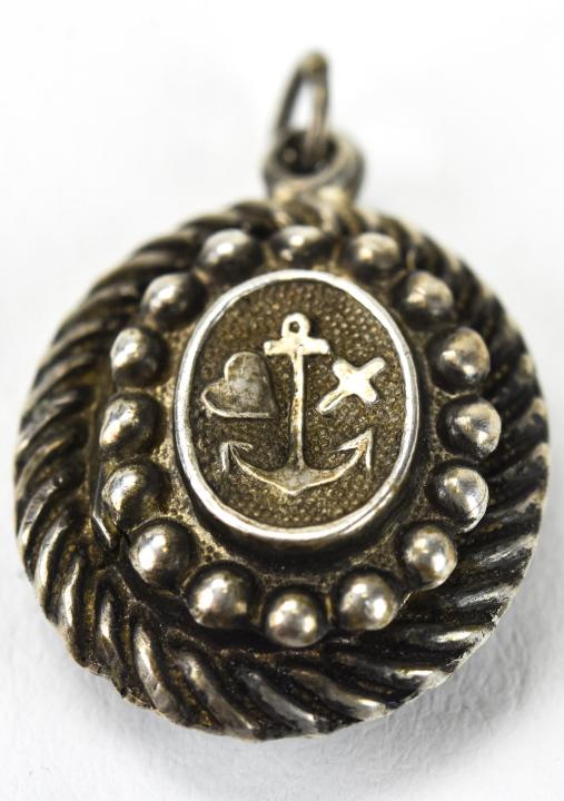 Antique Faith Hope & Charity Sterling Locket: Antique Faith Hope & Charity Sterling Locket. Repousse sterling silver faith hope and charity locket necklace pendant. 1 inch with bail.