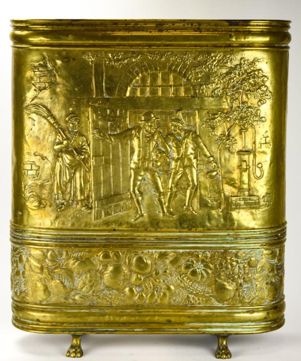 Antique Repousse Brass Umbrella / Cane Stand: Antique Repousse Brass Umbrella / Cane Stand. With claw feet, repousse motif of people working in a courtyard. 25.5 inches x 21.5 inches x 7.5 inches.