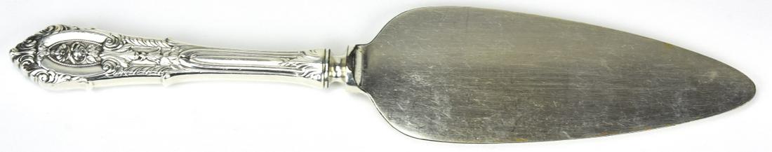 Sterling Silver Handle Cake Serving Utensil: Sterling Silver Handle Cake Serving Utensil. Hallmarked. Measures 10 inches in length.