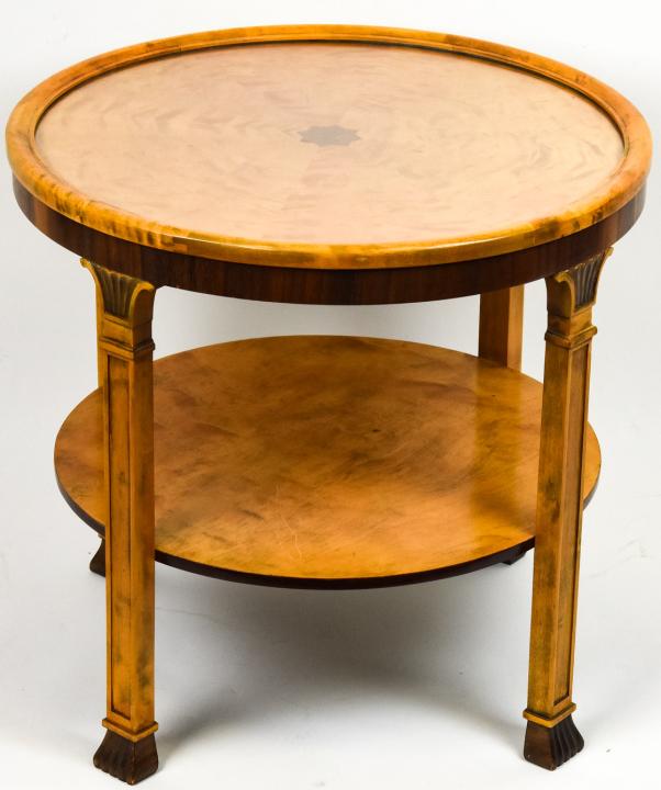 Biedermeier Empire Inlaid Glass Top Table: Biedermeier Empire Inlaid Glass Top Table. Round side table with 2 levels. Marquetry inlay on slip matched veneer top which is under an inlaid glass top. 4 carved fluted legs. 23 inches x 24 inches in