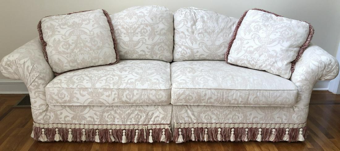 Custom Michael Thomas Upholstered Ivory Couch: Custom Michael Thomas Upholstered Ivory Couch. Neo classical matelasse patterned tapestry style fabric with silk tasseled trim. 33 inches x 96 inches x 39 inches.