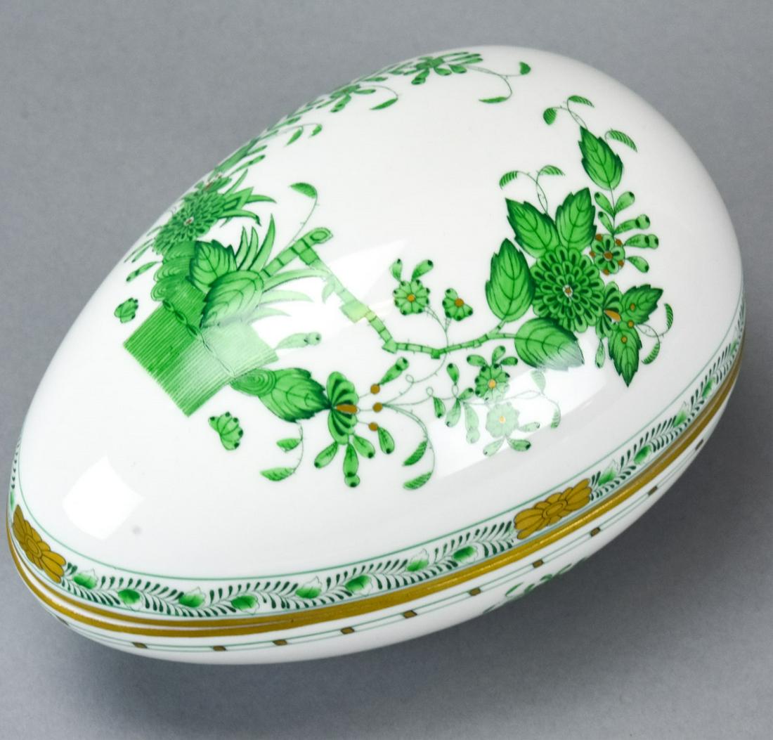 Herend Hungary Chinese Bouquet Porcelain Egg: Herend Hungary Chinese Bouquet Porcelain Egg. Egg form trinket box in the pattern Chinese bouquet by Herend. Hand painted motifs in green and gilt. Marked on bottom. 4 inches x 6.5 inches x 4.25 inche