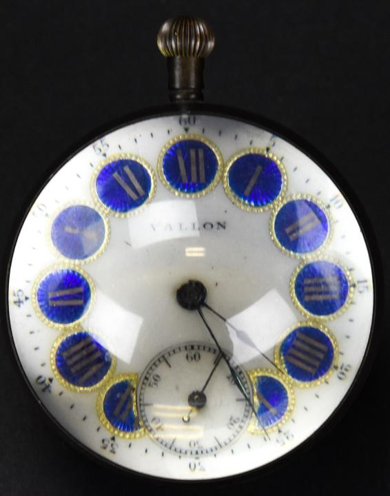 Antique Crystal Ball Swiss Vallon Mantle Clock: Antique Crystal Ball Swiss Vallon Mantle Clock. Crystal ball with wind up clock inside. Surrounded by bronze ring. 3 inches in diameter.