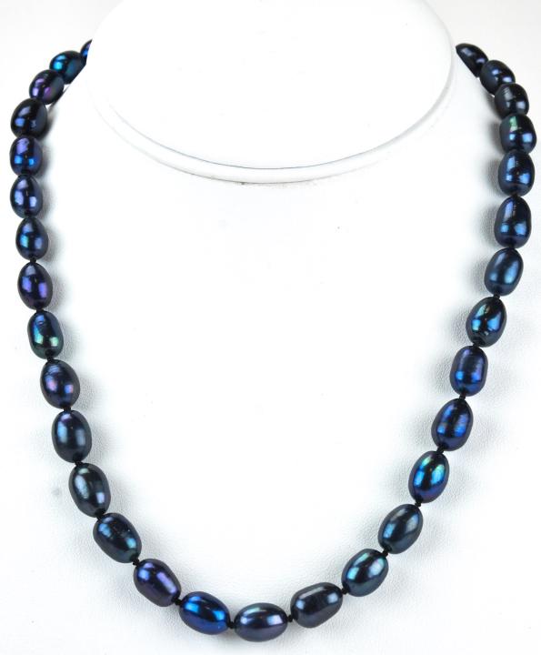 Handmade Tahitian Black Baroque Pearl Necklace: Handmade Tahitian Black Baroque Pearl Necklace. Measures 18 inches in length, hand knotted on silk thread, filigree clasp.
