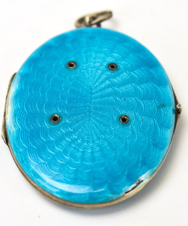 Antique Sterling Silver & Guilloche Enamel Locket: Antique Sterling Silver & Guilloche Enamel Locket. Blue enamel locket necklace pendant. Measures 2 inches in length.