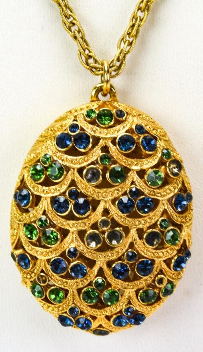 Vintage Gilt Metal & Rhinestone Crystal Locket: Vintage Gilt Metal & Rhinestone Crystal Locket Necklace. Chain measures 27 inches in length.