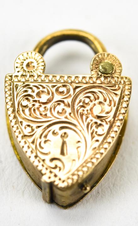 Antique 19th C Yellow Gold Padlock Charm: Antique 19th C Yellow Gold Padlock Charm or Pendant. Measures .75 of an inch in length.