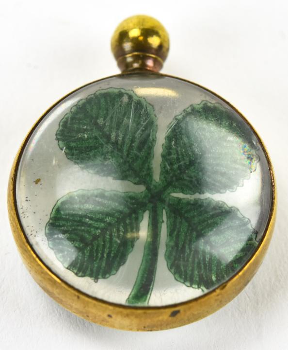 Vintage Four Leaf Clover Magnified Glass Pendant: Vintage Four Leaf Clover Magnified Glass Pendant. Measures just over 1 inch in length.