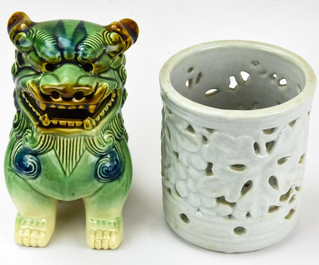 Chinese Porcelain Foo Dog & Reticulated Brush Pot: Chinese Porcelain Foo Dog & Reticulated Brush Pot. This lot features a figural foo dog statue and a reticulated porcelain brush pot, marked on the bottom. Foo dog measures 7 inches x 4 inches x 5 inch