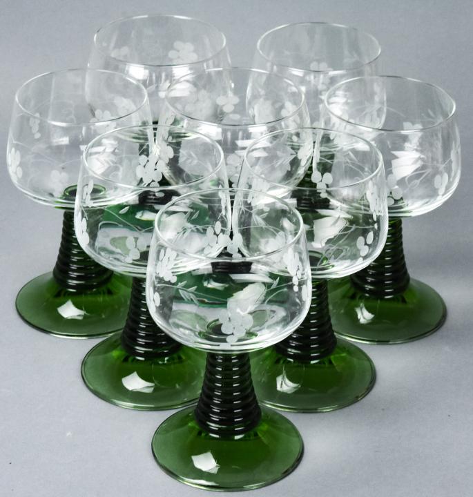20th C. Etched Hand Blown Green Stem Wine Glasses: Eight 20th C. Etched Hand Blown Green Stem Wine Glasses. Graduated and ribbed chunky green glass stems. Etched with grape and grape leaf motif. 5 inches x 4 inches in diameter.