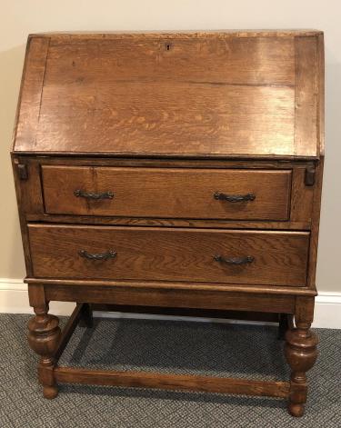 Tudor Quarter Sewn Oak Slant Top Desk: Tudor Quarter Sewn Oak Slant Top Desk. Slant top bankers desk in quarter sewn oak. 39 inches x 29 inches x 18 inches.