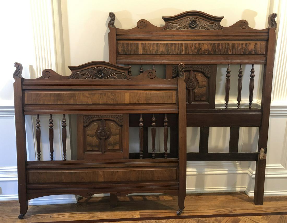 Art Nouveau Heavily Carved Flame Mahogany Bed: Art Nouveau Heavily Carved Flame Mahogany Bed. Heavily carved pediments at head and foot board. Accents of flame mahogany and carved spindles. 66 inches x 54 inches