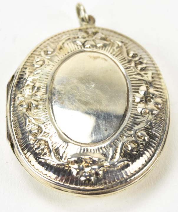 Antique Sterling Silver Locket Necklace Pendant: Antique Sterling Silver Locket Necklace Pendant. 2.25 inches in length.