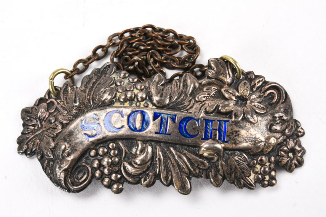 Antique Sterling & Enamel Scotch Decanter Label: Antique Sterling & Enamel Scotch Decanter Label. Measures 2.75 inches in width.