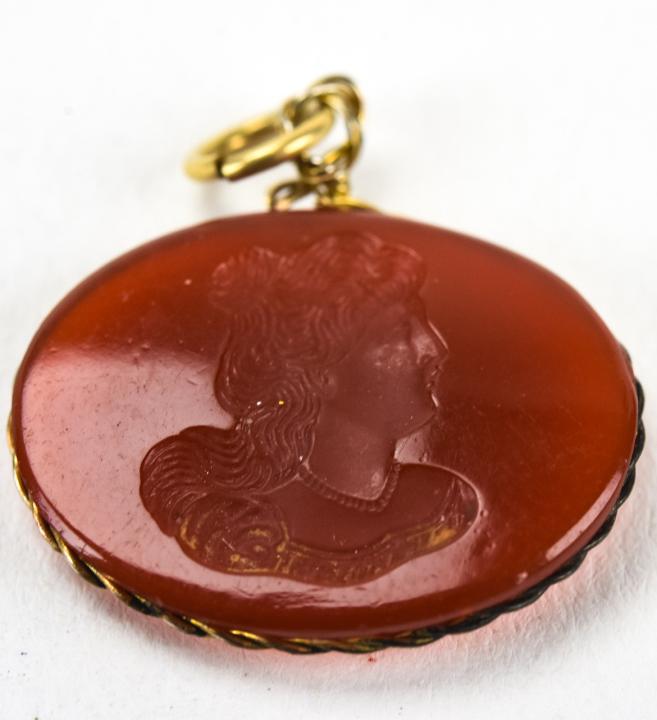 Antique Carved Portrait Intaglio Necklace Pendant: Antique Carved Portrait Intaglio Necklace Pendant. Measures just under 1 inch in length.
