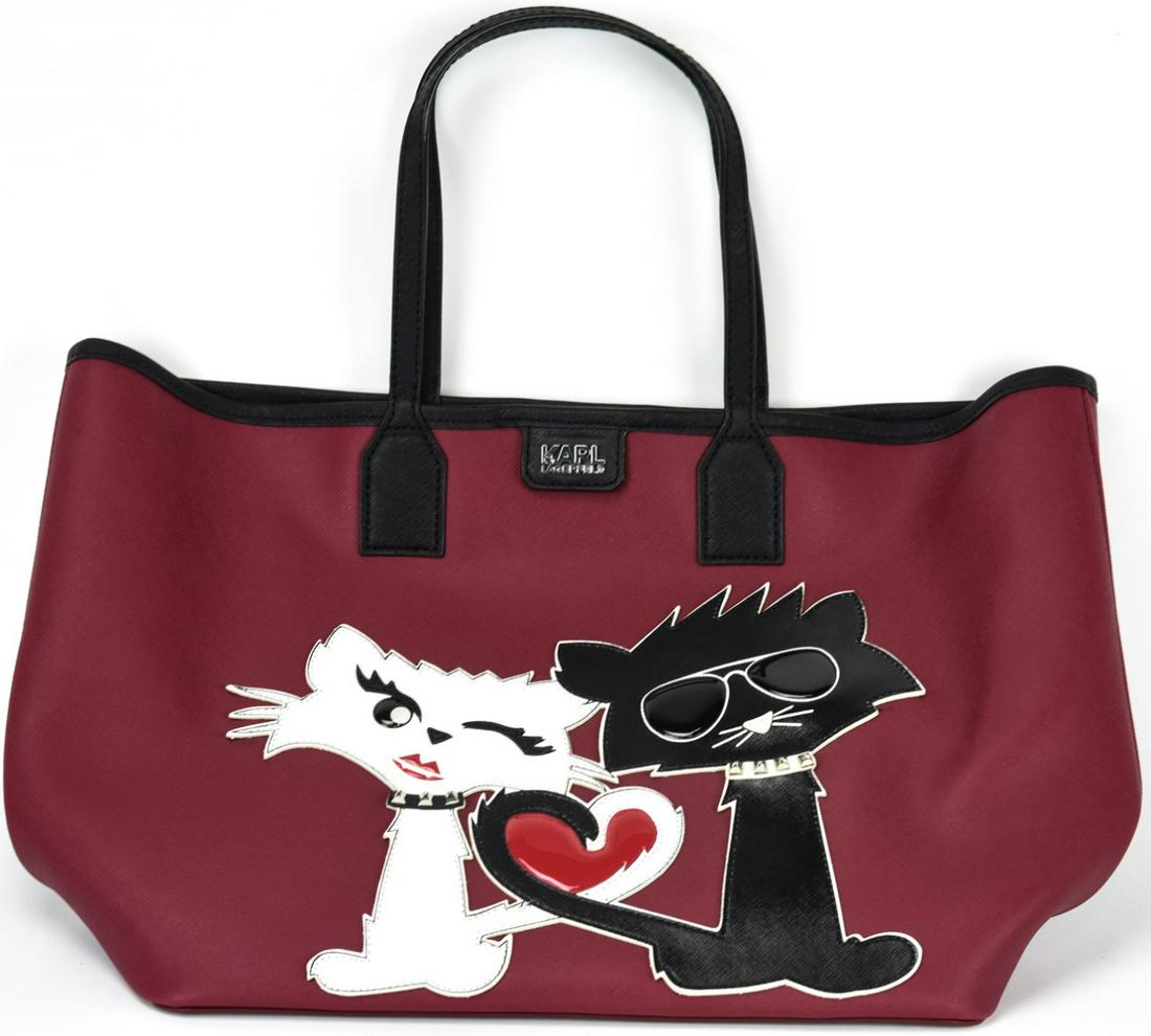 Karl Lagerfeld Choupette Saffiano Leather Tote Bag: Karl Lagerfeld Choupette Saffiano Leather Tote Bag / Purse. Featuring a motif of Lagerfeld's cat Choupette. With original dust bag. 11.25 inches x 18 inches x 7 inches.