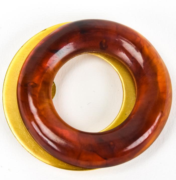 Circa 1930s Art Deco Amber Bakelite Dress Clip: Circa 1930s Art Deco Amber Bakelite Dress Clip. Measures 2 inches in width.