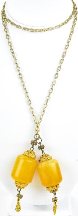 Vintage Faux Amber Lariat Tassel Necklace: Vintage Faux Amber Lariat Tassel Necklace. Measures 37.5 inches in length.