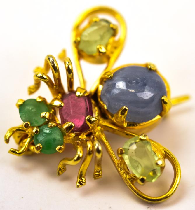 Estate Vermeil Sterling Gemstone Set Bee Brooch: Estate Vermeil Sterling Gemstone Set Bee Brooch. Measures 7/8 of an inch in width. Set with ruby, sapphires and emeralds of commercial quality.