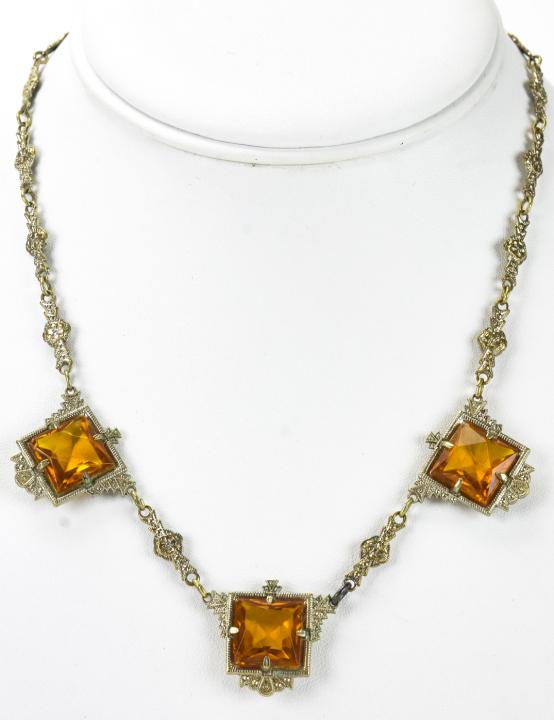 Antique Art Deco Citrine Glass Pendant Necklace: Antique Art Deco Citrine Glass Pendant Necklace. Measures 16 inches in length.