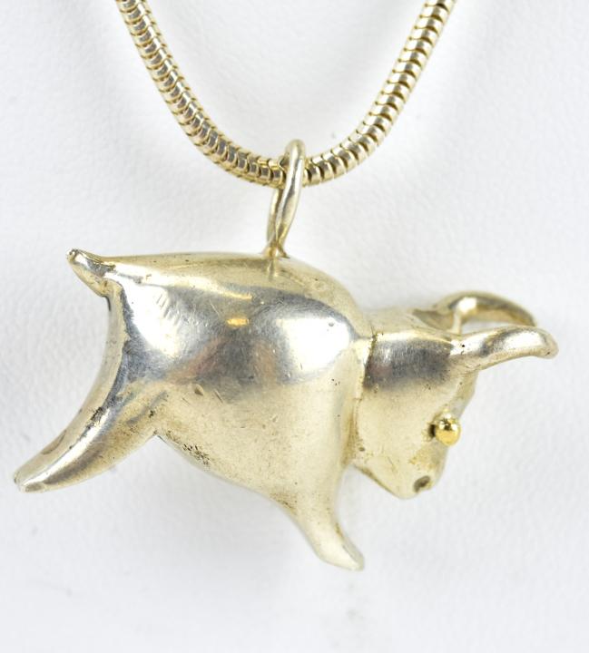 Erwin Pearl Sterling & 14kt Bull Pendant Necklace: Erwin Pearl Sterling & 14kt Bull Pendant Necklace. Sterling silver necklace with Erwin Pearl sterling and 14kt figural bull pendant. Necklace clasp is hallmarked, bull pendant is hallmarked. Measures