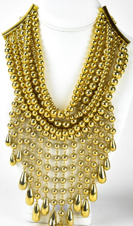 Givenchy C 1995 Gilt Metal Statement Necklace: Givenchy C 1995 Gilt Metal Statement Necklace. Givenchy statement necklace with signed logo charm. Adjustable from 15 inches to 19 inches, with 8 inch drop at center.
