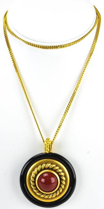 Yves Saint Laurent Oxblood Coral Paste Necklace: Yves Saint Laurent Oxblood Coral Paste Necklace. YSL gilt metal necklace with oxblood coral paste and gilt metal rope design pendant. Signed on back. chain measures 27 inches, pendant measures 2.5inch