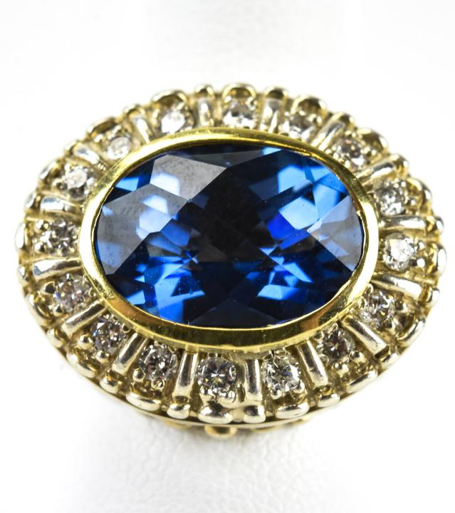 Robert Baum Sterling 18k Gold Diamond Ring: Robert Baum Sterling 18k Gold Diamond Ring. Sterling silver and 18k yellow gold ring set with 16 brilliant cut diamonds, and faceted iolite center by Robert Baum Jewelers. Hallmarked and initialed. Ri