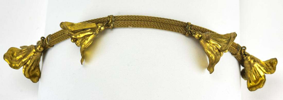 Rare Schiaparelli 1930s Hand Made Brass Bracelet: Rare Elsa Schiaparelli 1930s Hand Made Brass Bracelet. With bell flower design, one flower with applied plaque. Measures 8 inches.