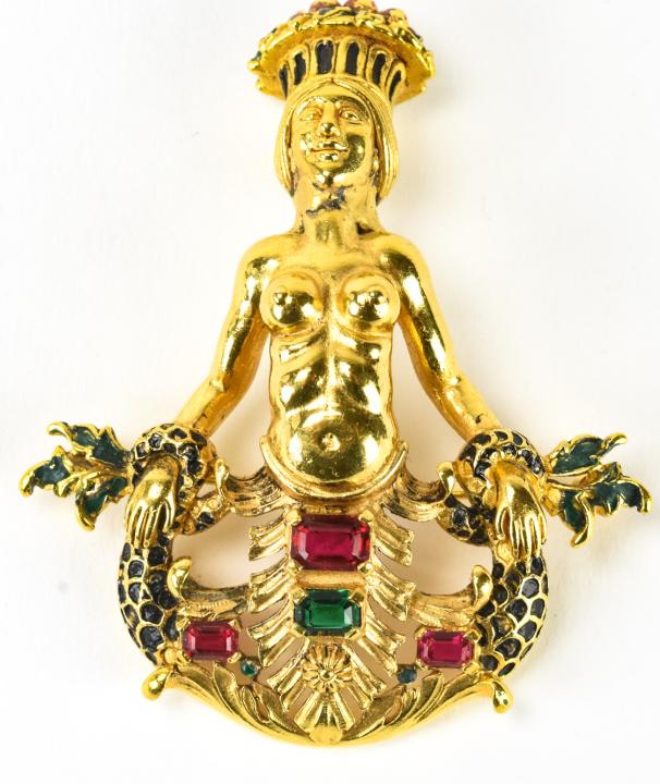 Rare Trifari Circa 1940 Melusine Mermaid Brooch: Rare Trifari Circa 1940 Melusine Mermaid Brooch. Rare unsigned Trifari dimensional nude mermaid / melusine brooch with emerald and ruby rhinestones. Possibly a prototype. Measures 2.75 inches x 2.25 i