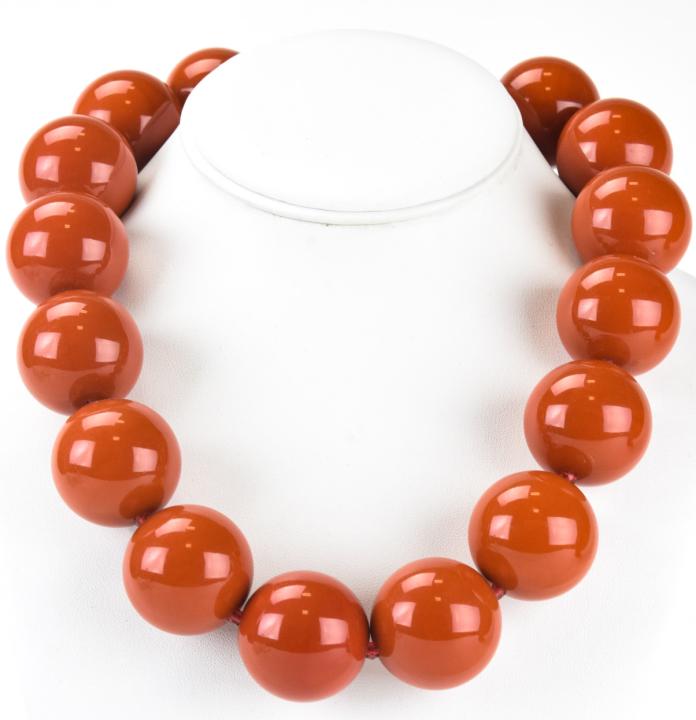 Missoni Style Amber Acrylic Ball Necklace: Missoni Style Amber Acrylic Ball Necklace. 30mm amber acrylic ball necklace with 18k clasp. Attributed to Missoni. Clasp marked 750. Measures 20 inches in length.