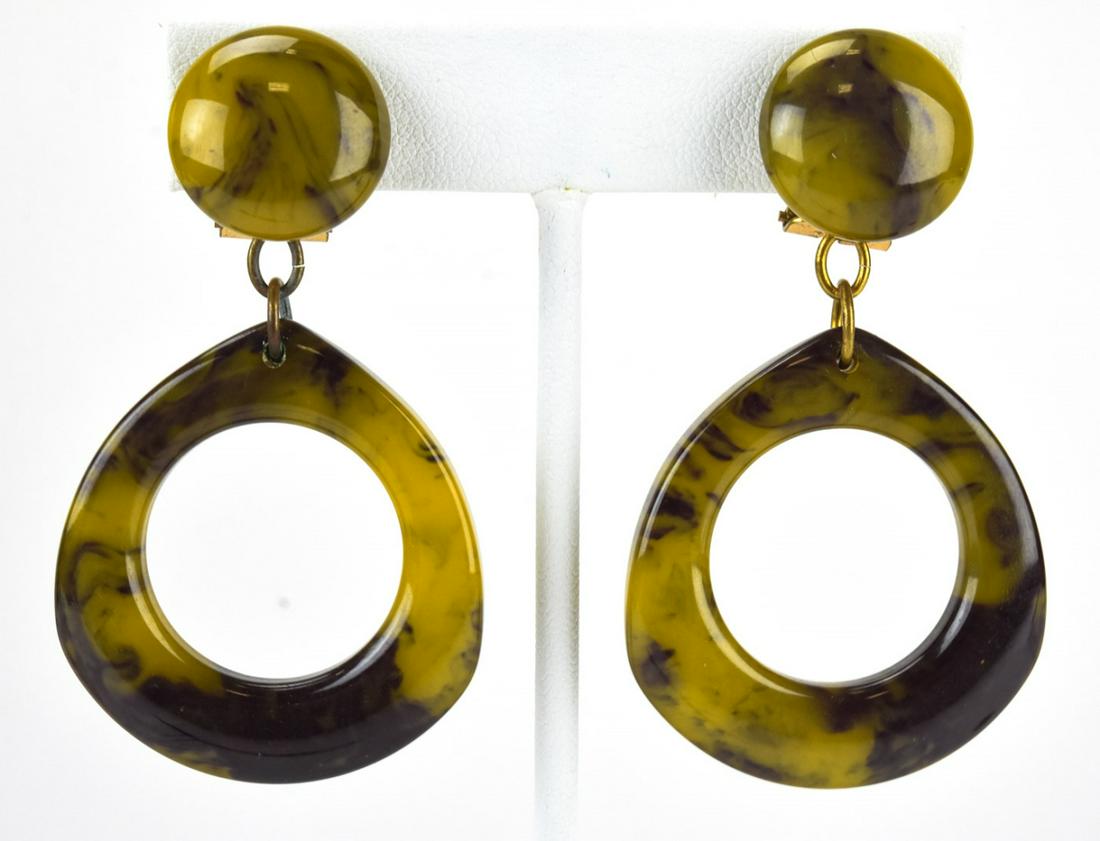 Pair 1950s Faux Tortoise Bakelite Earrings: Pair 1950s Faux Tortoise Bakelite Earrings. With European clip backs. Each measures 2.5 inches in length.