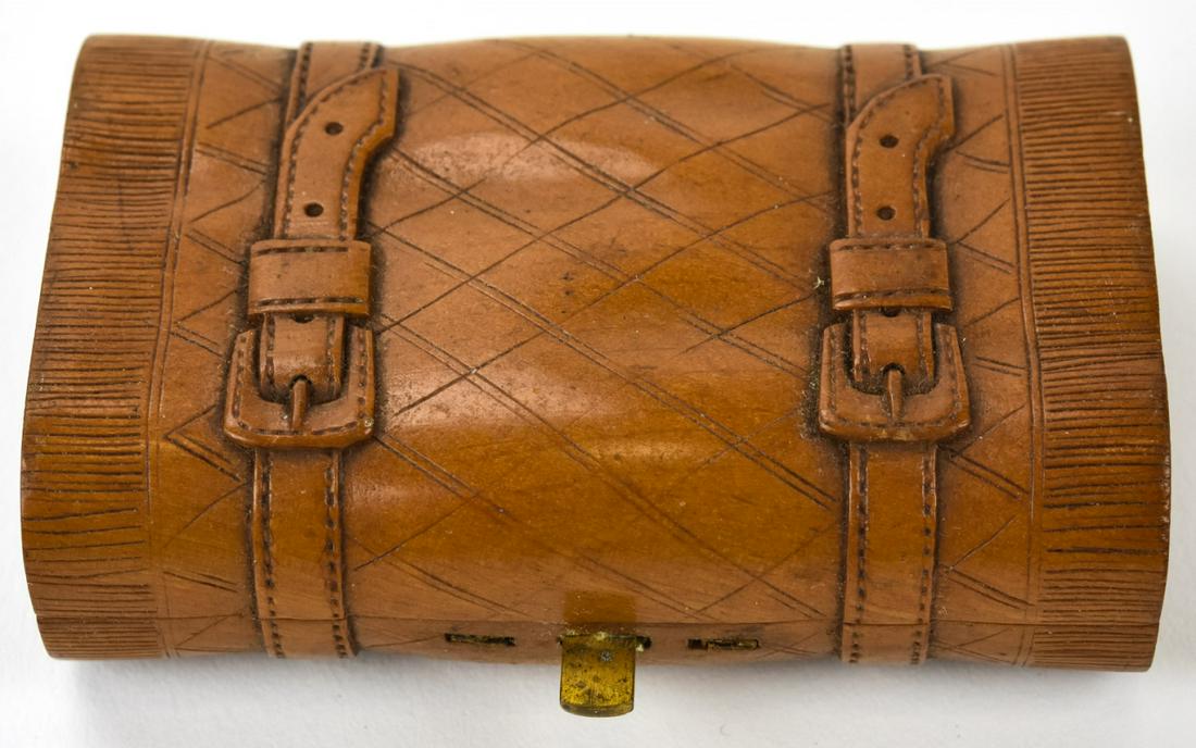 Antique Black Forest Hand Carved Clutch Purse: Antique Black Forest Hand Carved Clutch Purse. Figural carved wood piece in the form a luggage piece. Measures 3.25 x 2.25 inches.
