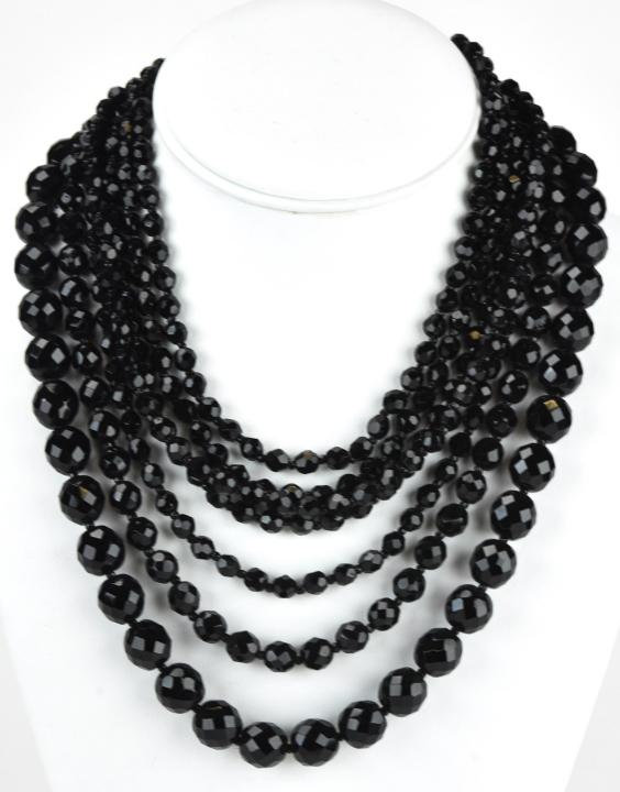 Vintage Miriam Haskell French Jet Necklace: Vintage Miriam Haskell Multi Strand French Jet Necklace. Signed. Seven strands of varying size beads. Measures 16.5 inches at shortest length.