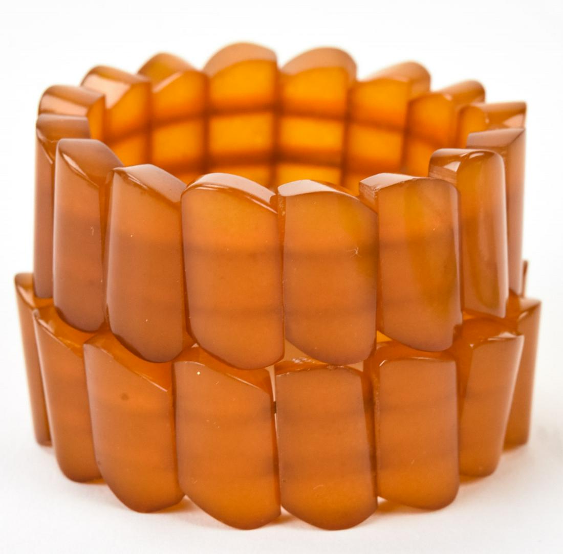 Pair Vintage Carved Amber Beaded Panel Bracelets: Pair Vintage Carved Amber Beaded Panel Bracelets. Total weight approximately 58 grams.