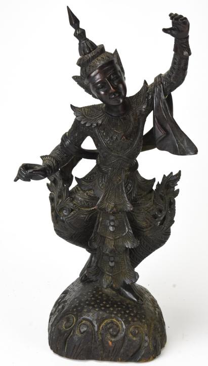 Antique Heavily Carved Indonesian Statue of Dancer: Antique Heavily Carved Indonesian Statue of Dancer. Hand carved statue on carved base. 21 inches x 10 inches in diameter.