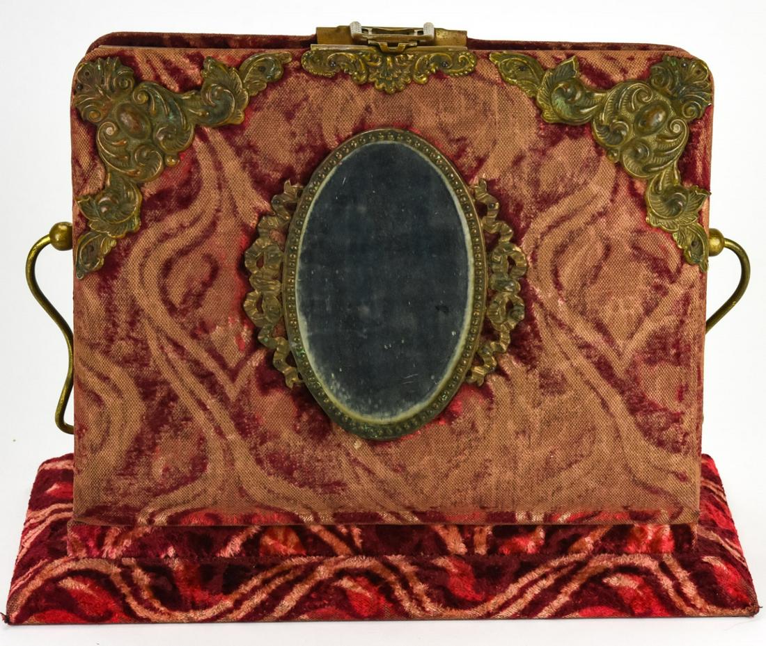 Antique Victorian Velvet Photo Album Stand: Antique Victorian Velvet Photo Album & Stand. Red velvet album with mirror at front with stand. Album measures 11 inches x 9 inches x 2.5 inches.