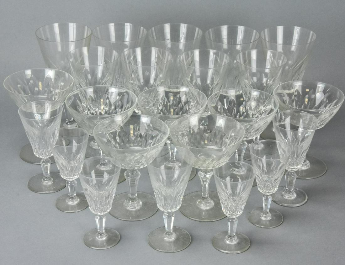 24 Pieces Baccarat Crystal Stemware / Glasses: 23 Pieces Baccarat Crystal Stemware / Glasses. Collection includes champagne, water, wine and cordial glasses. Tallest glass measures 7 inches tall.